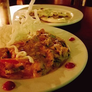 Silk Road - Indian red curry with veggies, and hot buttered naan. Beautifully presented and perfectly spiced. - Indian Near Me - New Orleans, Louisiana