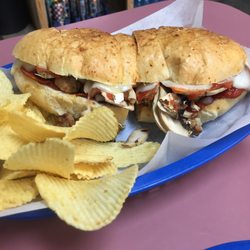 Katie's Subs - Pizza sub with a side of chips