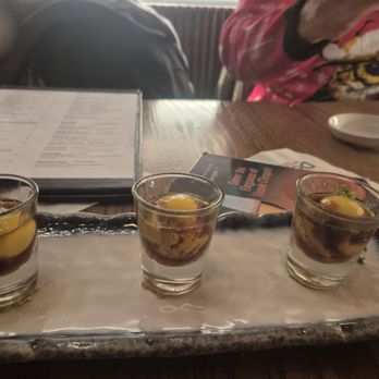 Douzo - uni shots. The raw egg was a little gross, tbh... Comes 2 per order, we asked to order 5 and were refused (wtf!) - Sushi Bars Near Me - Boston, Massachusetts