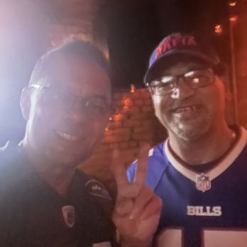 Snafu - Thats me in my JET jersey , and good friend of over 45 years MC. . Awsome time , made better by a JET Opening day victory over the BILLS - Sports Bars Near Me - New York, New York
