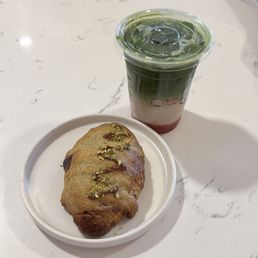 Strawberry matcha latte and pistachio croissant