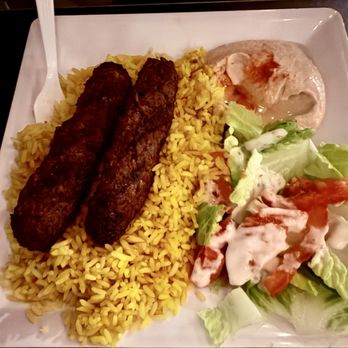 The Green Olive - Kafta kebab plate -- well-seasoned kebab served with rice, fresh sides, hummus, and pita bread. - Mediterranean Near Me - Gardena, California The Green Olive - Kafta kebab plate -- well-seasoned kebab served with rice, fresh sides, hummus, and pita bread. - Mediterranean Near Me - Gardena, California