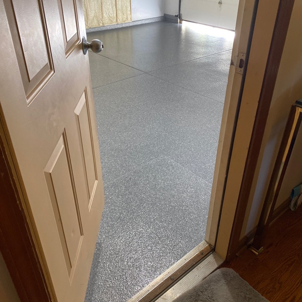 Armored Floors - a view of a garage from the doorway - Flooring Near Me - Naperville, Illinois