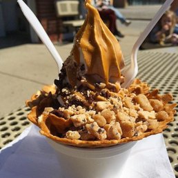 Chocolate and vanilla swirl soft serve dipped in peanut butter with cookie dough and brownie bits on a waffle dish! Chocolate and vanilla swirl soft serve dipped in peanut butter with cookie dough and brownie bits on a waffle dish!