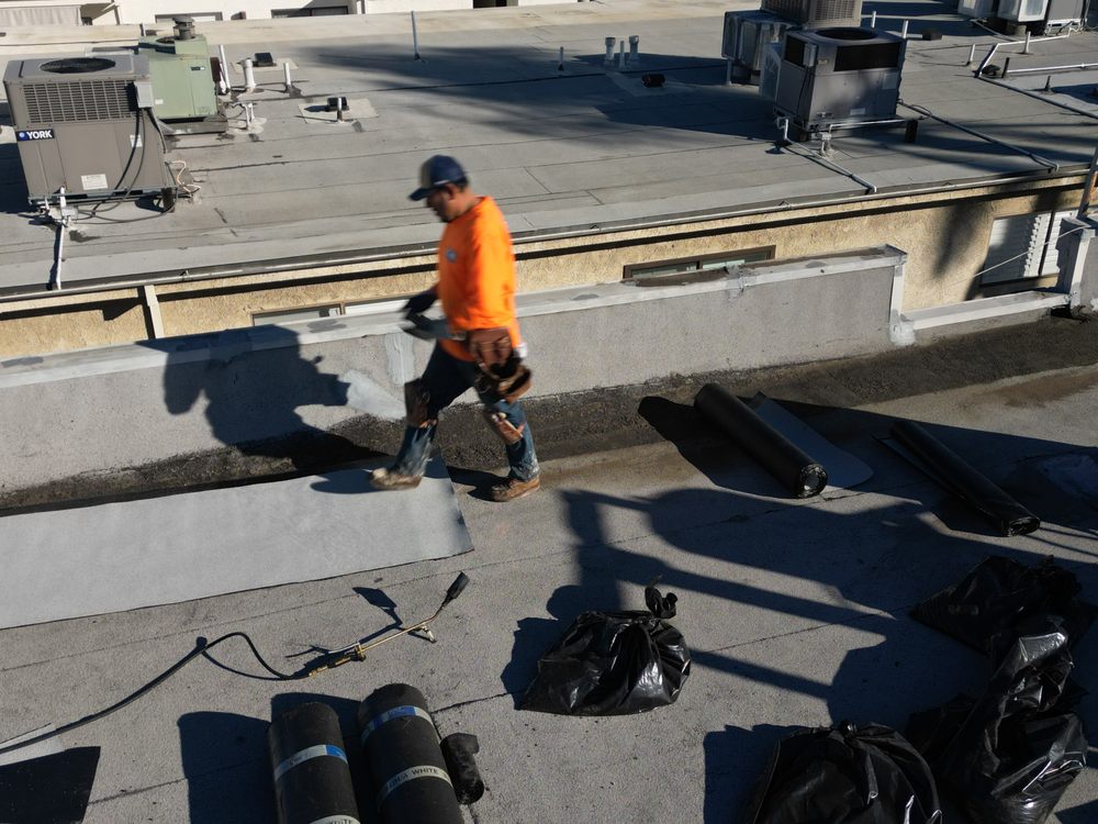 Slide of Shark Commercial Roofing Systems