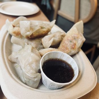Lin & Daughters - Pan Fried Curry Chicken Dumplings - Chinese Near Me - New York, New York Lin & Daughters - Pan Fried Curry Chicken Dumplings - Chinese Near Me - New York, New York