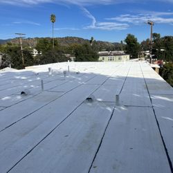 701 Roofing - 3 layer system
fireproof base roll
rubberoid smooth roll
polyfresc cool roof torch