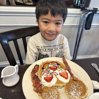 Maple N Jams Cafe - Happy guy with his Mickey Pancake - American Near Me - Burbank, Illinois