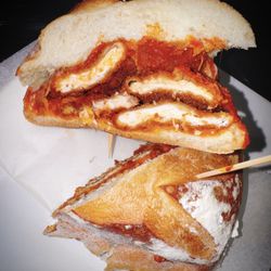 Tinto Italian Tapas & Pasta - Goodfella Chicken Parm:  Hand breaded chicken cutlet, baked with mozzarella cheese and tomato sauce on semolina bread