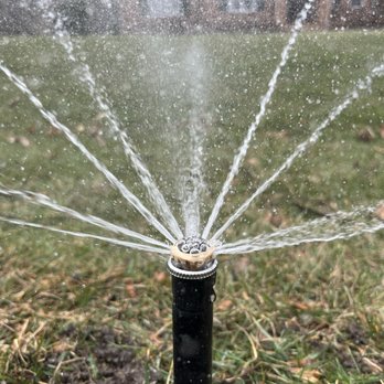 WaterWorks Irrigation - This is an actively watering spinkler head with a multi-trajectory nozzle, covering a range between 31' and 35'. - Irrigation Near Me WaterWorks Irrigation - This is an actively watering spinkler head with a multi-trajectory nozzle, covering a range between 31' and 35'. - Irrigation Near Me
