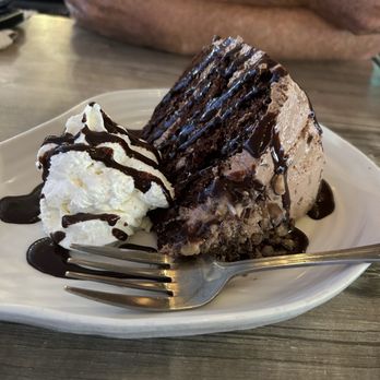 Rusty Bellies - 5 layer southern chocolate cake - Seafood Near Me - Tarpon Springs, Florida Rusty Bellies - 5 layer southern chocolate cake - Seafood Near Me - Tarpon Springs, Florida