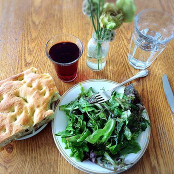 Luce - Soft and oily raisin focaccia with the house wine is the best! - Italian Near Me - Portland, Oregon