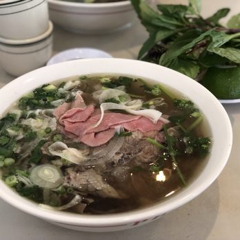 Pho 75 - Pho with slices of eye-round, well done flank, fat brisket, tendon, and tripe (#1 on the menu) - Vietnamese Near Me - Philadelphia, Pennsylvania Pho 75 - Pho with slices of eye-round, well done flank, fat brisket, tendon, and tripe (#1 on the menu) - Vietnamese Near Me - Philadelphia, Pennsylvania