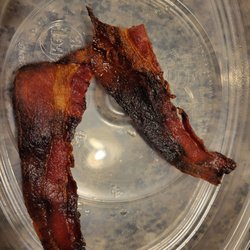 Burnt bacon for to go order.