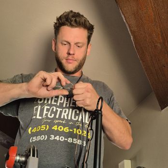 Shepherd Electrical - Electrician replacing a light fixture. - Electricians Near Me - Edmond, Oklahoma Shepherd Electrical - Electrician replacing a light fixture. - Electricians Near Me - Edmond, Oklahoma