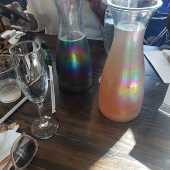 Mo' Brunch & Brews - The black mimosa carafe and the elderberry mimosa carafe. - Breakfast & Brunch Near Me - Houston, Texas