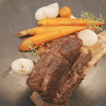 The Pines Modern Steakhouse - Braised Short Ribs. Incredibly moist, fall-apart tender, and packed with deep, beefy richness. - Steakhouses Near Me - S Highland, California The Pines Modern Steakhouse - Braised Short Ribs. Incredibly moist, fall-apart tender, and packed with deep, beefy richness. - Steakhouses Near Me - S Highland, California