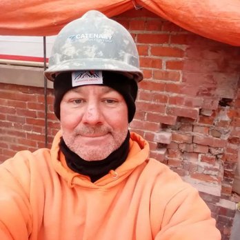 Wall Brothers Construction - The wall is already been fixed. The orange color tapolin as you can see is what I was using to cover the open house. - Masonry/Concrete Near Me - North Hills, California