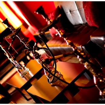 Red Mist Hookah Lounge & Cafe - a glass of wine on a table - Hookah Bars Near Me - Brooklyn, New York Red Mist Hookah Lounge & Cafe - a glass of wine on a table - Hookah Bars Near Me - Brooklyn, New York