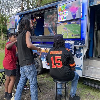 Pixel Reboot - Adults Playing Madden on the outside TVs! - Game Truck Rental Near Me - Jersey City, New Jersey Pixel Reboot - Adults Playing Madden on the outside TVs! - Game Truck Rental Near Me - Jersey City, New Jersey