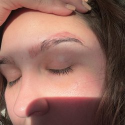 Bonafide Bare Beauty - 5 sessions 45 days apart, initially was a dark brown almost black ink color, almost gone. Can cover with minimal concealer.