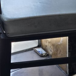 Kodo Sushi Sake - Ant traps in the corner under a table. From the looks of it, it hasn't been replaced in a loooong time. Gross!