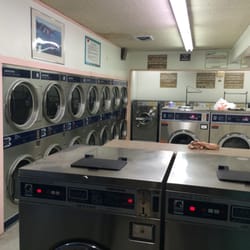 The Mat - A typical evening of an almost empty laundromat.