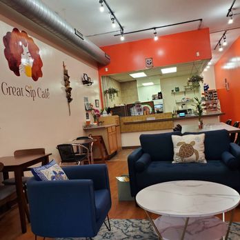 Great Sip Cafe - blue chairs and a coffee table - Coffee & Tea Near Me - Oak Park, Illinois