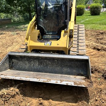 Richards Landscaping - the front end of a skid steer loader - Landscaping Near Me - Daleville, Virginia Richards Landscaping - the front end of a skid steer loader - Landscaping Near Me - Daleville, Virginia