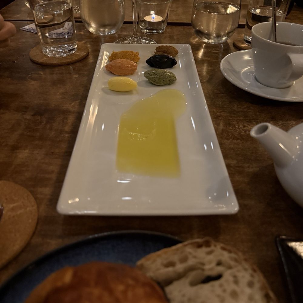 ADEGA Restaurant - Three bread options with olive oil and bunch of butter mixes - Portuguese Near Me - San Jose, California