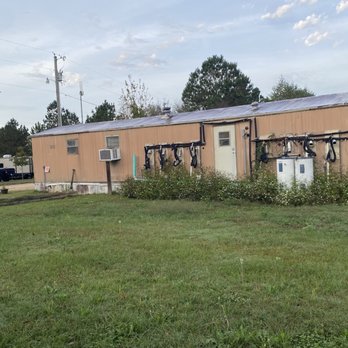 A-Okay RV Park - Back of now bathhouse and our view from our front door. - Campgrounds Near Me - Dothan, Alabama
