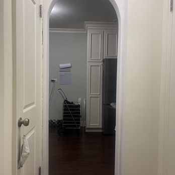 C.A. Renovations - After - They created an arch, prepped the area for painting, & left the opening wide enough for large items to pass through. - General Contractors Near Me