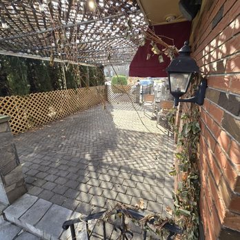 Jack's Brick Oven Pizzeria - Outside patio area (put away for the cold weather) - Italian Near Me - Norwich, Connecticut