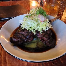 Elk chops, medium rare. Cooked to perfection. Elk chops, medium rare. Cooked to perfection.