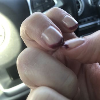 Noire Nail Bar ATL - Feathered line- rough edges and sloppy polish - Nail Salons Near Me - Chamblee, Georgia