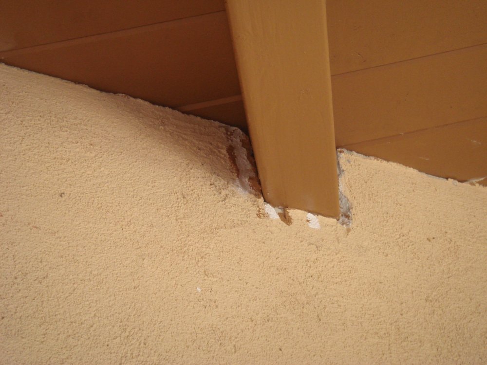 Slide of Knudsen Roofing