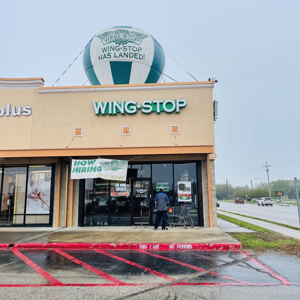 Wingstop - the outside of a wing shop - Chicken Wings Near Me - Angleton, Texas