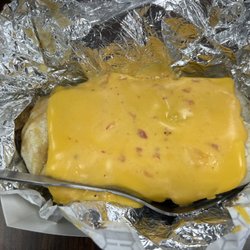 The Meat Shed - Burrito special. Shredded beef, beans, rice, and cheese