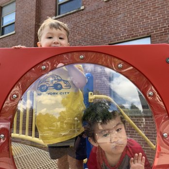 Cooperative Nursery School - Fun on the playground! - Child Care & Day Care Near Me - Urbana, Illinois Cooperative Nursery School - Fun on the playground! - Child Care & Day Care Near Me - Urbana, Illinois