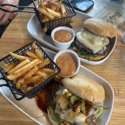 Molly Greens - The Spicy Southwest with Grilled Chicken (front) and the Vampire Repellent Burger (back)