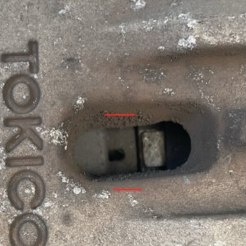 Big O Tires - About 70% of the brake pad remaining - Auto Repair Near Me - San Mateo, California Big O Tires - About 70% of the brake pad remaining - Auto Repair Near Me - San Mateo, California