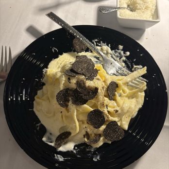 Cordi's Italian Gourmet - Fettuccine Alfredo with Truffles special (made in a cheese wheel!) - Italian Near Me - Brick, New Jersey Cordi's Italian Gourmet - Fettuccine Alfredo with Truffles special (made in a cheese wheel!) - Italian Near Me - Brick, New Jersey