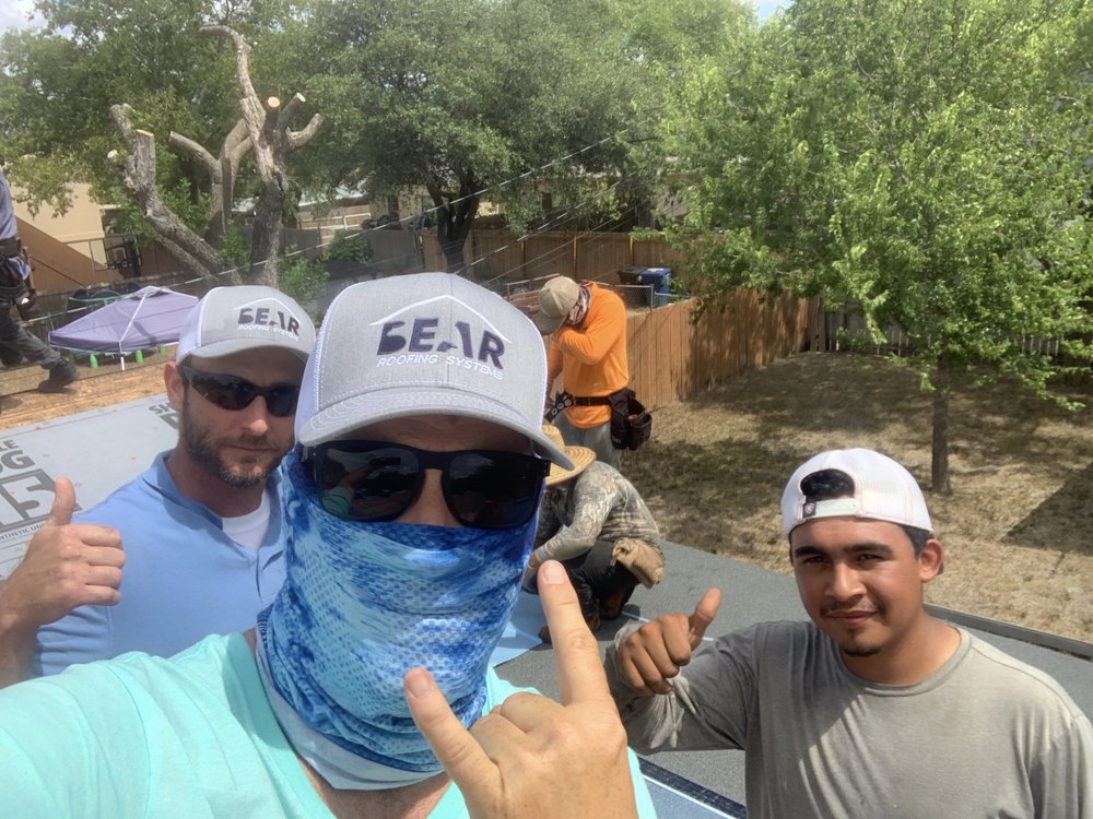 Slide of Bear Roofing Systems