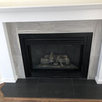 Smitty Construction Services - New fireplace surround that I asked for in middle of remodel - General Contractors Near Me