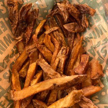 Wingstop - a close up of a basket of french fries - Chicken Wings Near Me - Pleasanton, California Wingstop - a close up of a basket of french fries - Chicken Wings Near Me - Pleasanton, California