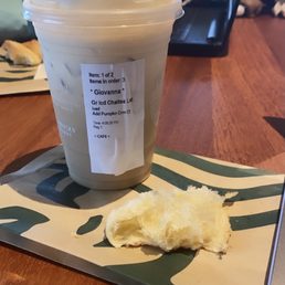 a cup of coffee and a banana peel