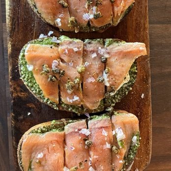 Postino Ballantyne - Smoked salmon pesto bruschetta board - Wine Bars Near Me - Charlotte, North Carolina Postino Ballantyne - Smoked salmon pesto bruschetta board - Wine Bars Near Me - Charlotte, North Carolina