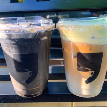 Cafe Comma - Charcoal Coconut Latte (left) - Coffee & Tea Near Me - Atlanta, Georgia Cafe Comma - Charcoal Coconut Latte (left) - Coffee & Tea Near Me - Atlanta, Georgia