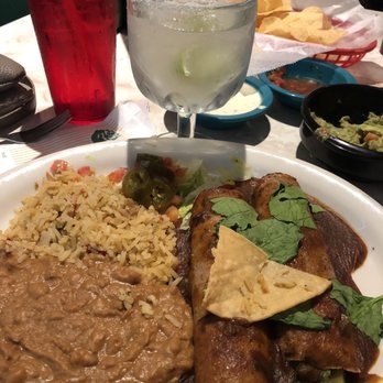 Chuy's - Veggie enchiladas with refried beans and rice (and a perfect margarita in the background) - Tex-Mex Near Me - Waco, Texas