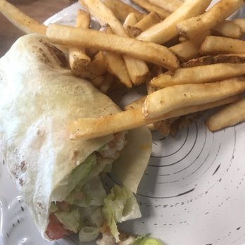 Huntley's Place - 1/2 of my fried chicken wrap Good size wrap and awesome fries! - Breakfast & Brunch Near Me - Virginia Beach, Virginia Huntley's Place - 1/2 of my fried chicken wrap Good size wrap and awesome fries! - Breakfast & Brunch Near Me - Virginia Beach, Virginia